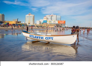 ATLANTIC CITY,  NEW JERSEY - August 3: The boardwalk and Casinos on August 3, 2015 in Atlantic City, New Jersey. Gambling was legalized in the city in 1976 and led to a resurgence.