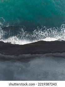 The Atlantic Ocean From Above On A Black Beach Waves