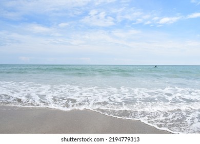 Atlantic Ocean Beach Waves On A Cloudy Day.