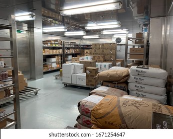 Atlantic, Ocean, December 22, 2019: Dry Store Room On A Cruise Ship. Provision Area Onboard. Many Bags And Boxes With Food Inside Storage. Huge Metal Room With Air Conditioning  And Many Goods.