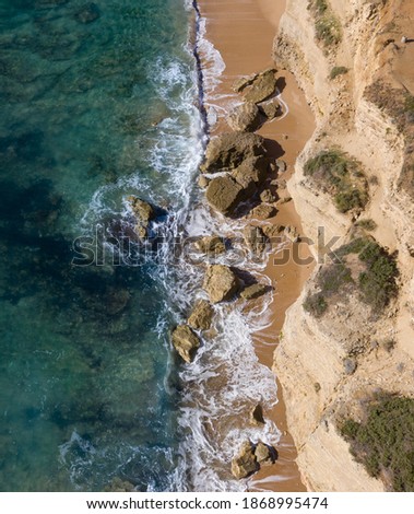 Similar – Aerial Drone View Of Dramatic Ocean Waves Crushing On Rocky Landscape