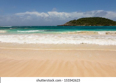 Atlantic Waves On Beautiful Golden Sandy Beach At Half Moon Bay Antigua