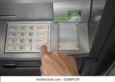 ATM Key Pad With Man Hand Is Entering Number On Atm Machine To Withdraw Money