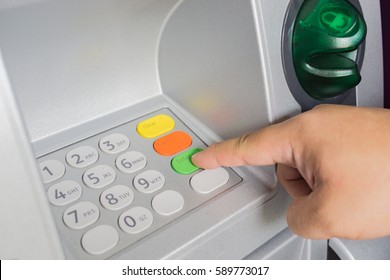 ATM Key Pad With Man Hand Is Entering Number On Atm Machine To Withdraw Money