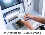 Atm money cash machine. Woman withdraw money bill. Holding american hundred dollar cash. Bank credit card, us dollar