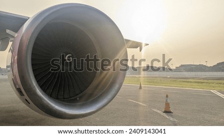 The atmosphere in the morning is sunny with a cfm56 engine