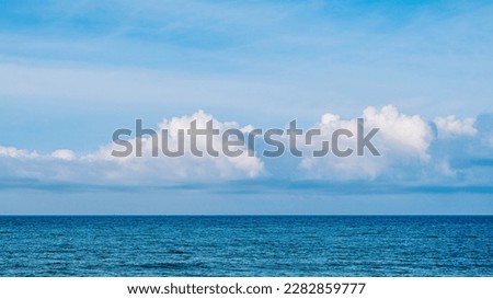 Atmosphere panorama real photo beautiful summer white cloud clear blue sky horizon line calm empty sea. Concept paradise life. Design relax wallpaper background. More tone format collection in stock