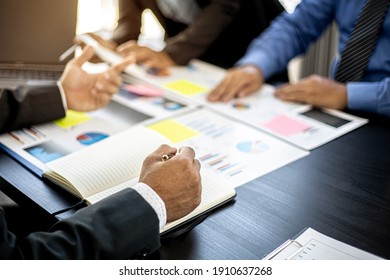 The atmosphere in the startup's meeting room was attended by three delegates to brainstorm and plan the company's operations. Young businessmen form startups and are growing higher. Startup idea.