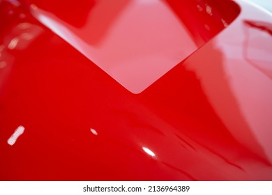 Atmospheric And Abstract Close-up Shot Of A Red Car, Creating A Background Texture Reminiscent Of High Technology, Modernism, Advanced Materials