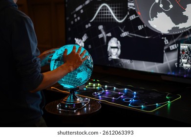 An atmospheric scene featuring an interactive blue globe and a futuristic screen displaying digital data. A person explores the world through modern technology, illuminated by neon lights