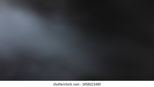 Atmospheric smoke 4K Fog effect. Smoke in slow motion on black background. White smoke slowly floating through space against black background - Shutterstock ID 1858221685