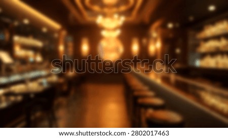 An atmospheric view of a bar interior featuring warm ambient lighting, wooden surfaces, and shelves stocked with bottles, creating a cozy and inviting atmosphere.