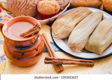Atole de chocolate, mexican traditional beverage and tamales, Made with cinnamon and chocolate in Mexico