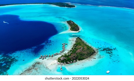 Atoll From Bora Bora Shallow And Deep Water Whit A Island And Sailing Boats View From Above Make With  Drone