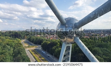 Atomium spheric element with panoramic view on city Brussels, Belgium