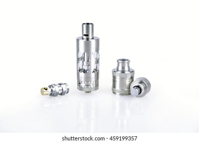 Atomizers and coils for e-cig mod on white background