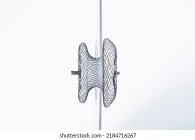 Atrial Septal Defekt. Devices for invasive cardiology procedures. Device for atrial septal defect closure on a white background.patent foramen ovale PFO closure device.  - Shutterstock ID 2184716267
