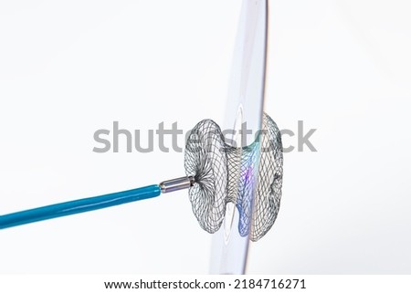 Atrial Septal Defekt. Devices for invasive cardiology procedures. Device for atrial septal defect closure on a white background.patent foramen ovale PFO closure device. 
