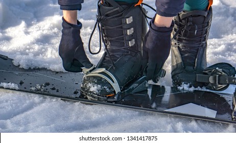 Attach The Boots To The Snowboard. Snowboard Equipment. Hire Full Snowboarding Equipment (snowboards, Boots)