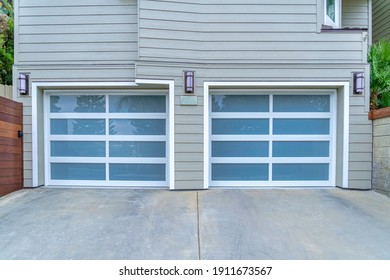 Attached Two Car Garage Of Home With Glass Doors In San Diego CA Neighborhood