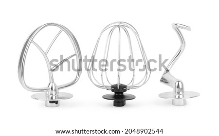 attachments for a planetary mixer, for whipping cream and kneading dough, on a white background concept of kitchen appliances