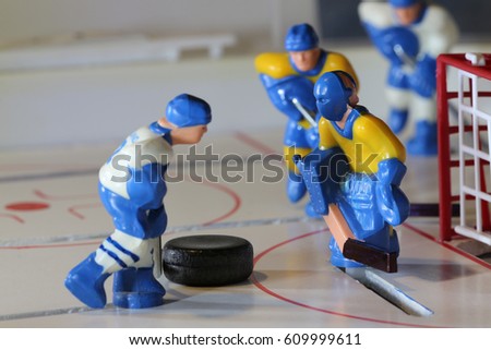 attack ice hockey match, table game macro shot