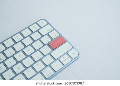 attack writing on a computer keyboard on a white background