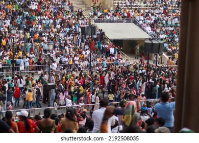 Attari, Punjab - June 1, 2022: Indians Dancing On Music Before The Start Of The Attari-Wagah Border Flag Ceremony