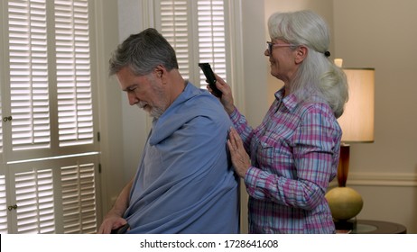 An Attempt At Cutting Her Husband's Hair At Home Leads To Laughter By This Mature Woman. 