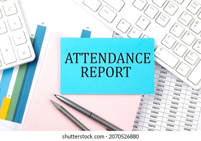 ATTENDANCE REPORT Text On Blue Sticker On Chart With Calculator And Keyboard,Business