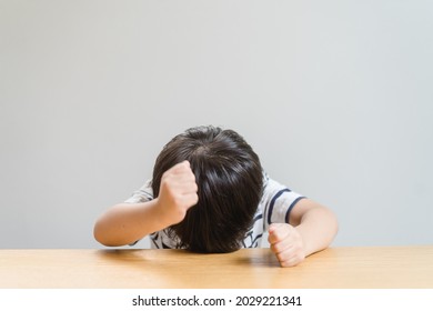 Attention deficit hyperactivity disorder (ADHD) Concept.Angry Asian boy screaming,upset, sad, negative attitude.Stressed child, Kid with bad behavior stubborn.mental health.Autism kid.Angry child. - Shutterstock ID 2029221341