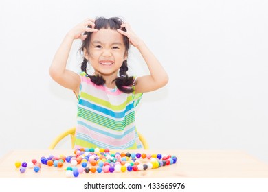 Attention Deficit Hyperactivity Disorder Or  ADHD Children Are Practicing Beads.