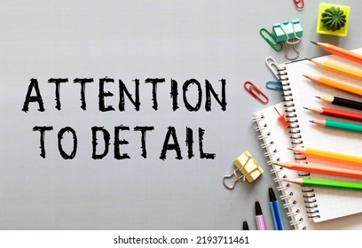 ATTENTION TO DETAILS text on clipboard with keyboard on wooden background. - Shutterstock ID 2193711461