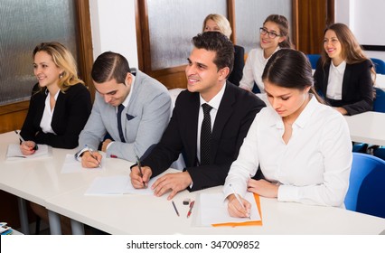 Attentive Adult Business Students At The Desks In Classroom. Selective Focus

