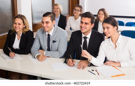 Attentive Adult Business Students Sitting At The Desks In Classroom. Selective Focus
