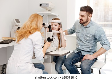 Attentive dad making sure his child being healthy - Powered by Shutterstock