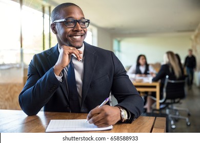 Attentive Enthusiastic New Hire Career Worker Employee Taking Notes Listening With Nice Smile