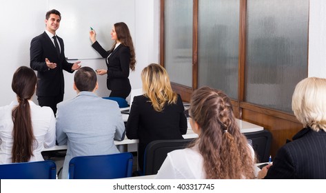 Attentive Students With Couch At The Training In Business School 
