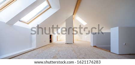 Attic is converted into light spacious living room