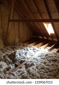 Attic Corner With Dormer And Insulation