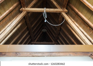 attic, wooden beams in old loft ,roof before construction close-up