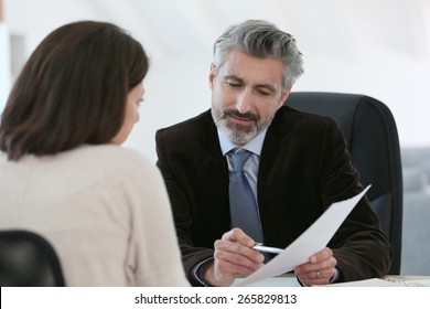 Attorney Meeting Client In Office