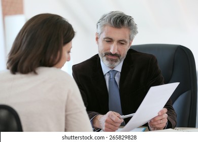 Attorney Meeting Client In Office