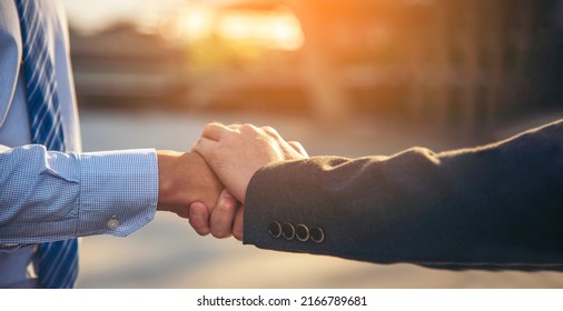 Attorney promise Lawyer partnership Businessman handshake together law firm. Teamwork Two Men Trust honesty business handshake promise respect partner. Diversity Attorney team Partner hands together