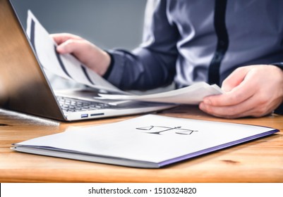 Attorney, Prosecutor Or Solicitor Working With Legal Papers In Law Firm And Company. Busy Lawyer With Brief Documents, Agreement And Contract. Jurist With Laptop In Office. Court, Justice And Business