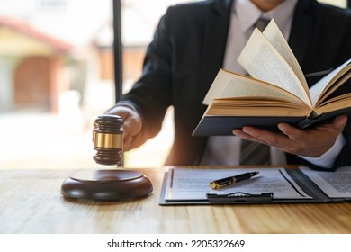 Attorneys or lawyers who are reading the statute of limitations Consultation between male lawyers and business clients, tax and legal and legal services firms. - Powered by Shutterstock