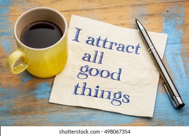 I Attract All Good Things - Positive Affirmation  Words - Handwriting On A Napkin With A Cup Of Coffee