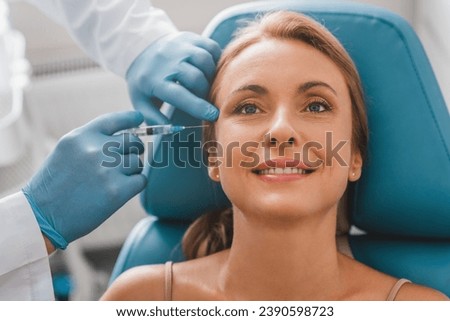 Similar – Image, Stock Photo Aesthetic Procedure Applying Botox, Hyaluronic Acid, and Tensor Threads