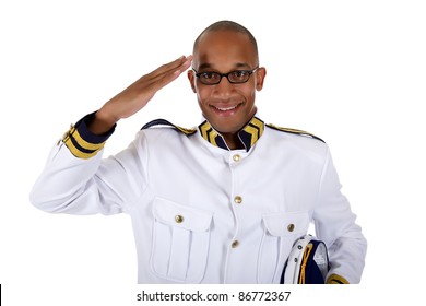 Attractive African American Young Male Cruise Ship Steward Gives Salute . Studio Shot. White Background.