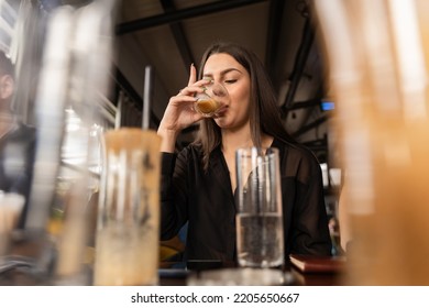 Attractive and amazing young businesswoman is drinking her coffee - Shutterstock ID 2205650667
